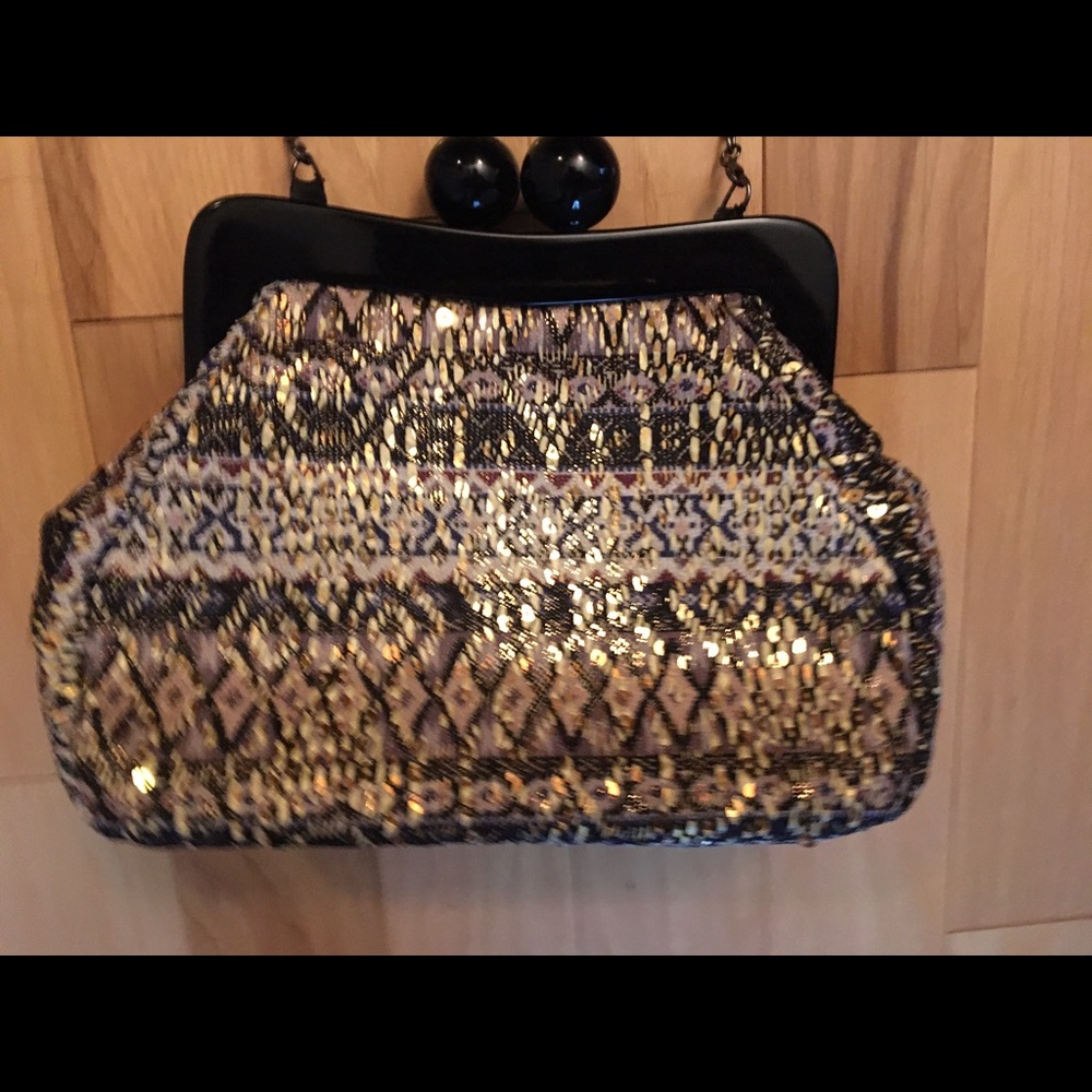 Lisa Lebow gold and black clutches